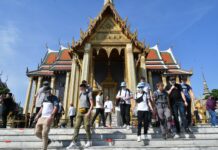 Opinion: Keep Calm and Let’s Cautiously Welcome Chinese Tourists Back A file photo of tourists at the Grand Palace complex.