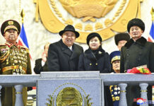 Kim Jong Un Shows off Daughter, Missiles at N. Korean Parade