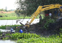 Mother Confesses to Dumping Her Baby In Missing Child Case Rescue workers use an excavator to search for the remains of a 8-month-old baby in Nakhon Pathom province on Feb. 27, 2023.