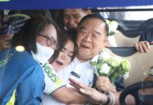 Opinion: Phalang Pracharath Rebranded as Party for National Reconciliation – And They Don’t Think It’s Absurd A supporter hugs deputy PM Gen. Prawit Wongsuwan, who is also the leader of the ruling Phalang Pracharath Party, during a visit to Samut Prakarn province on Mar. 3, 2023.