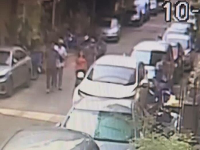 Security camera shows the victims being pulled into a car in Bangkok’s Din Daeng district on Mar. 10, 2023.