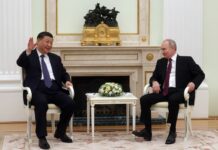 Putin Welcomes China’s Xi to Kremlin Amid Ukraine Fighting