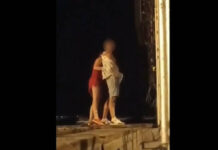 Pattaya Police Hunt Couple in Beach Sex Clip A screenshot from a video published Mar. 3, 2023 of a couple engaging in a public sex act in Pattaya City.