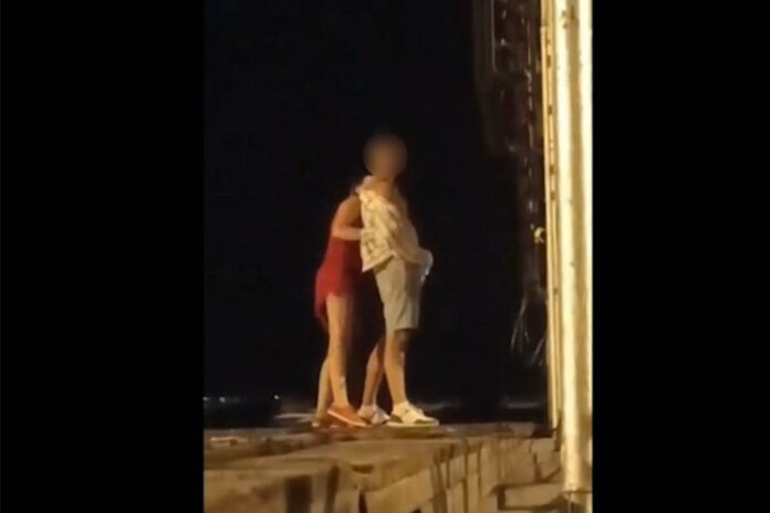 A screenshot from a video published Mar. 3, 2023 of a couple engaging in a public sex act in Pattaya City.