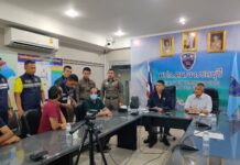 Iraqi Arrested After Overstaying Visa 8 Years Khalid Majeed Ali Ali, in green shirt, at Chonburi Immigration Office on Mar. 28, 2023.