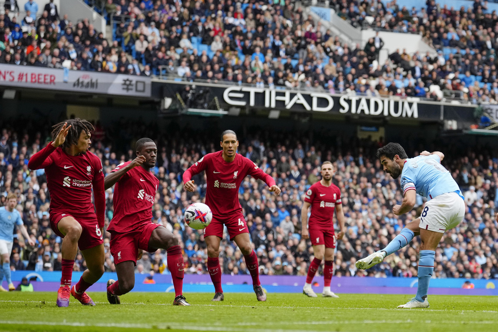 Liverpool jolt Man City as Arsenal go four points clear