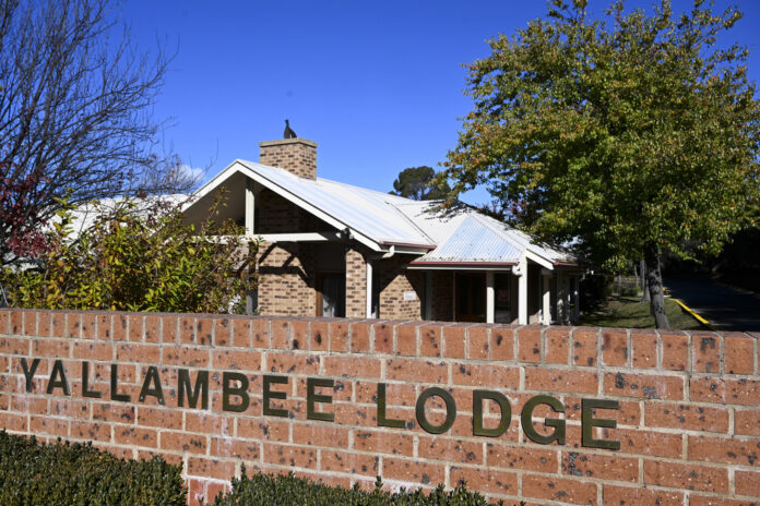 The entrance to the aged care facility Yallambee Lodge in Cooma, Australia is photographed on Friday, May 19, 2023. Photo: Lukas Coch / AAP Image via AP The entrance to the aged care facility Yallambee Lodge in Cooma, Australia is photographed on Friday, May 19, 2023. Photo: Lukas Coch / AAP Image via AP