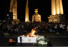 Opinion: Silent Semi-Military Coup and the Normalization of Indirect Military Rule Protesters burn a symbolic coffin during a protest against the Constitutional Court's decision to suspend Move Forward Party leader Pita Limjaroenrat from his MP duties pending its ruling on whether he violated election law at the Democracy Monument on July 19, 2023.
