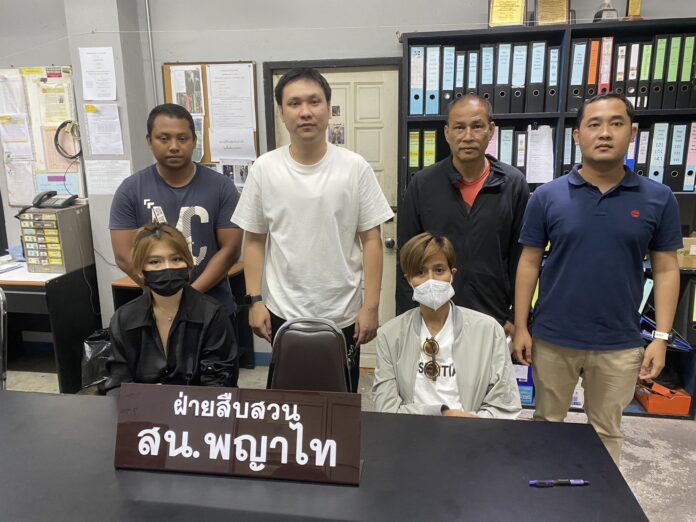 Nanatsicha Torprasert, 36, and Issariyakorn Ruangdet, 33, at Phayathai Police Station after their arrests on Jul. 28, 2023. Nanatsicha Torprasert, 36, and Issariyakorn Ruangdet, 33, at Phayathai Police Station after their arrests on Jul. 28, 2023.