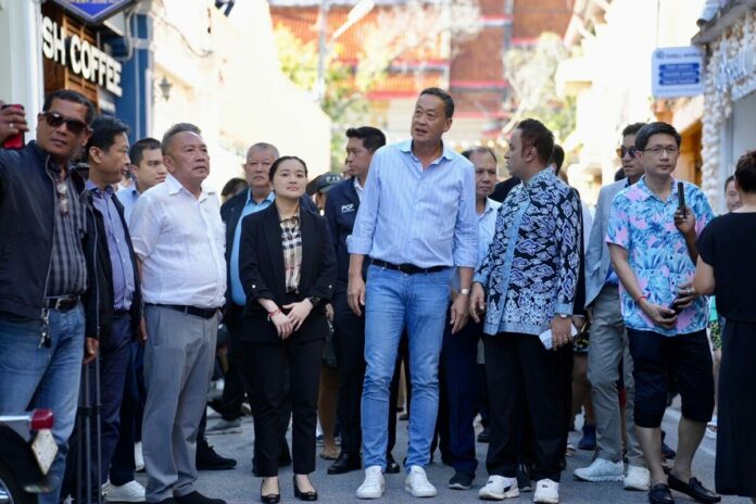 PM Srettha Thavisin, center, during his visit to Phuket province on Aug. 25, 2023.