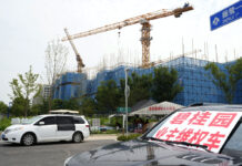 China’s Government Tries To Defuse Economic Fears After Real Estate Developer’s Debt Struggle