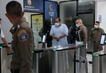Opinion: Thai ‘Influential Figures’ Are More Numerous Than Meet the Eyes Police escort Praween Chankhlai, or Kamnan Nok, to the Criminal Court on Sept. 9, 2023.