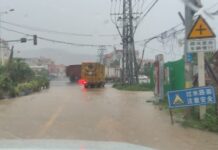 High Water Sweeps Fire Truck Into a River, Leaving 5 Missing, as Tropical Storm Hits China