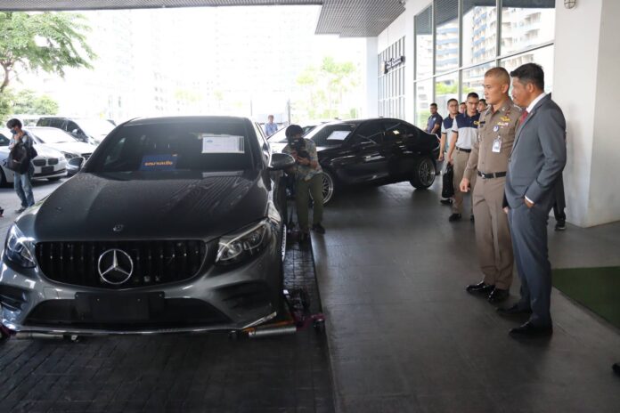 Central Investigations Bureau commander Jirapob Puridet and Malaysian Embassy’s security liaison counselor Mohd Nadhir Bin Kassim inspects a seized Mercedes-Benz at Crime Suppression Division headquarters on Oct. 27, 2023. trafficking