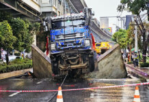 The Truck Is Lifted From The Bangkok Road Pit After 7 Hours