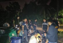 Cops Arrest 30 Illegal Chinese Workers Police question a group of migrant workers arrested for illegally working in Phuket province on Dec. 19, 2023.