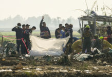 Remains of Fireworks Explosion Victims Taken to Thai Temple Where Families Give DNA To Identify Them