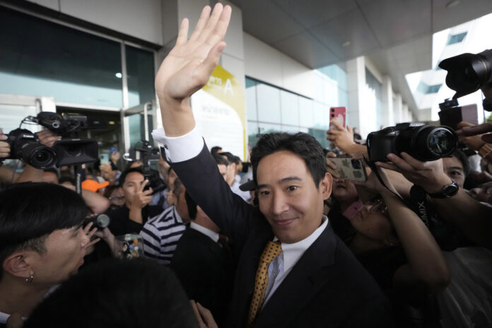 Former leader of Move Forward Party Pita Limjaroenrat, center, waves to his supporters as he leaves Constitutional Court in Bangkok, Thailand, Wednesday, Jan. 24, 2024. The court ruled Wednesday that popular politician Pita, who was blocked from becoming prime minister even though his party placed first in last year’s election, did not violate the election law and can retain his seat in Parliament. Photo: Sakchai Lalit / AP