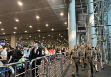 Suvarnabhumi Immigration Braces For Chinese New Year Travel Rush Immigration officials inspect the immigration checkpoint at Suvarnabhumi Airport on Feb. 6, 2024.