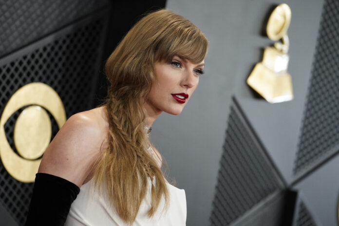 FILE - Taylor Swift arrives at the 66th annual Grammy Awards on Feb. 4, 2024, in Los Angeles. Photo: Jordan Strauss / Invision / AP File