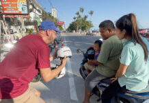 An American PTSD Survivor Distributes Helmets to Thai Children American helmet