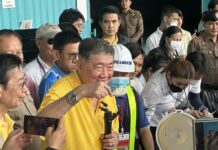 Opinion: How to Quickly Undermine the Reputation of Thai Rice Deputy PM and Commerce Minister Phumtham Wechayachai shows a scoop of cooked 10-year-old rice during an inspection of a warehouse in Surin province, where the stock of rice originally brought in as part of PM Yingluck Shinawatra's controversial rice price mortgage program are kept, on May 6, 2024.