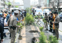 Bangkok Deadly Manhole Cover Prompts Thai Authorities To Act Police officers from Chokchai Police Station inspected the scene where a 59-year-old man stepped on a damaged manhole cover for electrical cable ducts and fell into the hole on May 3, 2024.