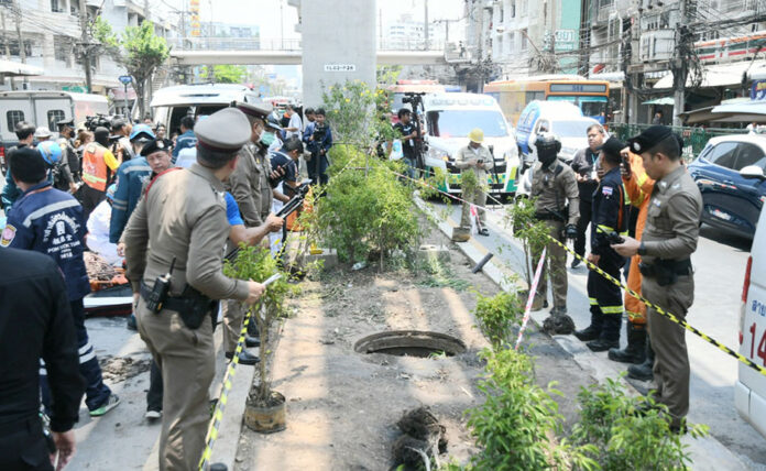 hole3 Police officers from Chokchai Police Station inspected the scene where a 59-year-old man stepped on a damaged manhole cover for electrical cable ducts and fell into the hole on May 3, 2024.