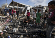 Israeli Strikes on Gaza Kill 18 And a Stabbing in Tel Aviv Kills 2 Amid Efforts to Prevent Wider War