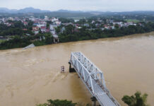Flooding Sweeps Away a Bus and a Bridge Collapses in Vietnam as Deaths Rise to 64 Vietnam