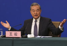 China’s FM Blasts the US over Tariffs at His Annual Meeting with Journalists china