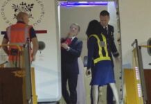 France’s First Lady Seems To Push Her Husband as They Land in Vietnam. He Says They Were Joking