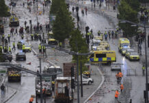 Driver Arrested After Car Plows into Celebrating Liverpool Fans