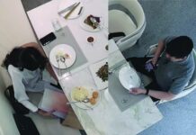 Menu Theft at Kaithong Original Leads to Legal Action CCTV footage from one of Kaithong's branches reveals a foreign male customer using his mobile phone to photograph the restaurant's menu, while a female customer takes the restaurant's menu book in her bag, on April 29, 2025.