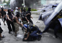 Dozens Arrested and Hurt in Clashes with Police Near Philippine Presidential Palace
