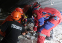 Rescuers Run Oxygen to Survivors in Indonesia School Building Collapse