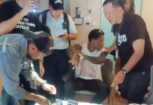 Cameroonian Man Wanted for 19kg Drug Smuggling Caught in Bangkok Police interrogate Interpol-wanted suspect Emmanuel after his arrest at his hotel room on Phetburi Road in Bangkok on October 1, 2025, for drug trafficking and illegal weapons possession.