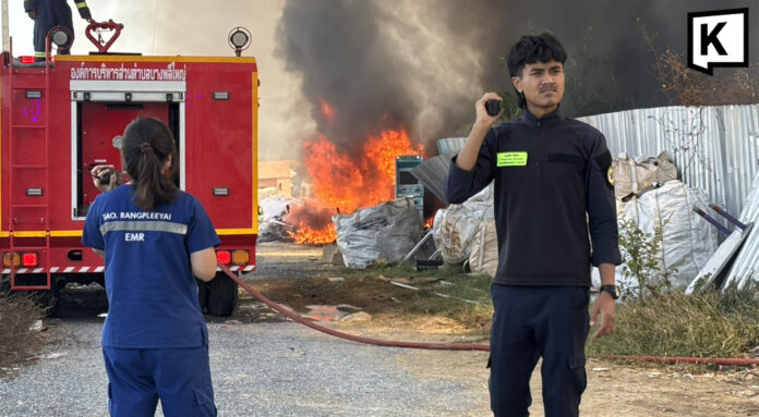 Fire hits scrap shop Fire hits scrap shop near Bangkok, blast injures firefighter