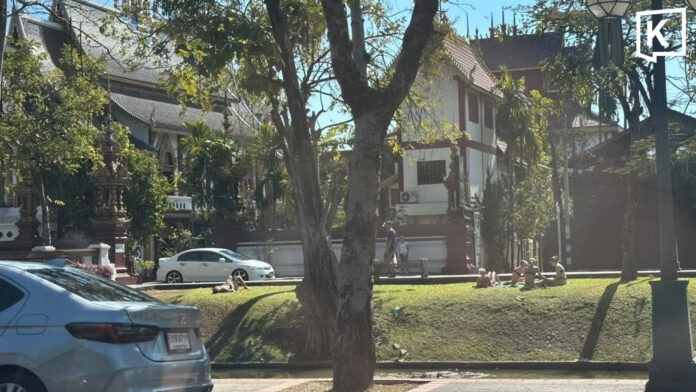 Tourists Sunbathing Outside Chiang Mai Temple Spark Backlash