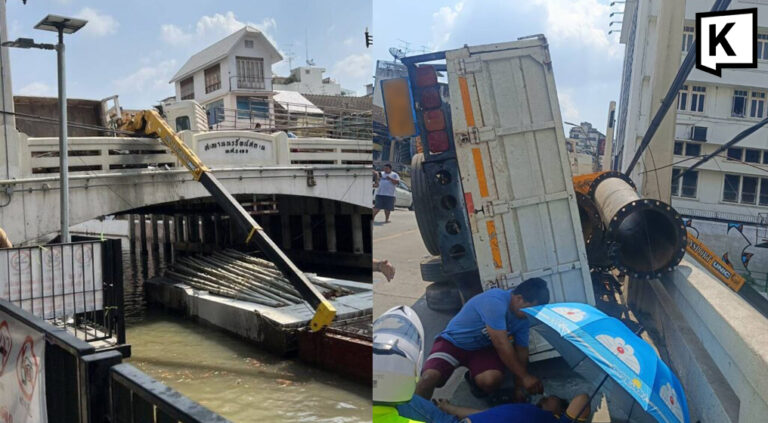 Crane truck overturns on Bangkok bridge, injuring two