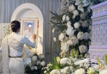 Bride in Thai wedding dress sings farewell at cremation of groom killed in cable accident before wedding