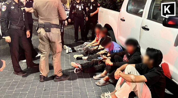 Police detain migrants after clash on Pattaya Walking Street