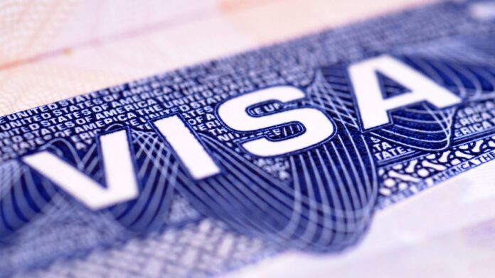 Closeup detail of a US visa document.