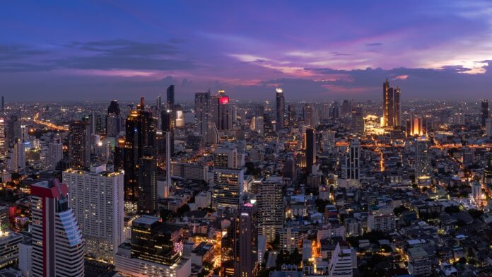 bangkok-business-district-cityscape-with-skyscraper-twilight-thailand-panorama-1-696x392.jpg