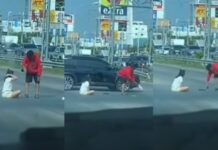 Thai woman sits in middle of intersection after lovers’ quarrel