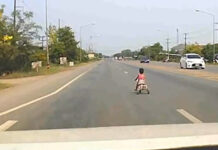 Dashcam shows toddler cycling onto busy Nong Khai road Dashcam shows toddler cycling onto busy Nong Khai road