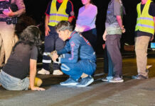 Drunk woman sits in road, narrowly avoids traffic hits Drunk woman sits in road, narrowly avoids traffic hits