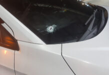 Ex-husband opens fire on car, injures former wife and man Ex-husband opens fire on car, injures former wife and man
