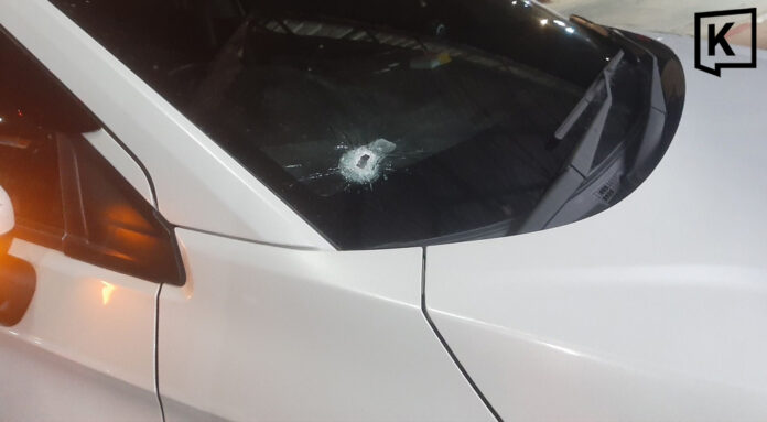 Ex-husband opens fire on car, injures former wife and man Ex-husband opens fire on car, injures former wife and man