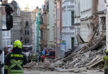 Rescuers search for 3 missing after German building collapse possibly caused by gas explosion